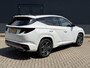 Hyundai Tucson 1.6 T-GDI PHEV N Line Sky 4WD / Dealer onderhouden / Fabrieksgarantie tot 03-2027 / Trekgewicht 1350 kg / Glazen schuif- en kanteldak / Elektrische achterklep / Stuur- Stoel & Achterbank verwarming / Adaptief cruise control / Rondomzicht camera / Stoelventilatie /