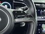 Hyundai Tucson 1.6 T-GDI HEV Premium | Leer | Stoel + stuurverwarming | Trekhaak | Trekgewicht 1650kg | Memory | Stoelventilatie |
