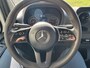 Mercedes-Benz Sprinter 314 2.2 CDI 143pk AUT-7 L2H2 EURO VI-D NAVI Camera ECC Keyless Bluetooth Navigatie-pakket Elektr.Spiegels+Verwarmd BlindSpot-Assist Regensensor Bordherkenning Trekhaak 3.500kg Trekvermogen Betonplex Wandbetimmerd
