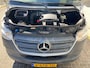 Mercedes-Benz Sprinter 314 2.2 CDI 143pk AUT-7 L2H2 EURO VI-D NAVI Camera ECC Keyless Bluetooth Navigatie-pakket Elektr.Spiegels+Verwarmd BlindSpot-Assist Regensensor Bordherkenning Trekhaak 3.500kg Trekvermogen Betonplex Wandbetimmerd