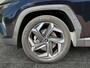 Hyundai Tucson Premium Sky 1.6 T-GDI 265pk PHEV 4WD | SCHUIF/KANTELDAK | 19'' LM-VELGEN | NAVI | CRUISE CONTROL | APPLE CARPLAY / ANDROID AUTO |