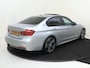 BMW 3-Serie 320i Edition M Sport Shadow Executive | Audio Media Pack | cruise control | electronic climate control | LED koplampen | lederen bekleding | lichtmetalen velgen 18" | M Aerodynamica | navigatiesysteem full map | elektrisch glazen schuif-/kanteldak | navigatiesysteem full map + hard disk | afneembare trekhaak |