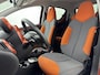 Toyota Aygo 1.0 VVT-i Dynamic Orange | All season | L.M. Velgen | Airco | Getint glas |