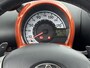 Toyota Aygo 1.0 VVT-i Dynamic Orange | All season | L.M. Velgen | Airco | Getint glas |