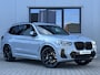 BMW X3 xDrive30e M sport 292 PK | Elek stoelen | Carbon | Laser | Keyless | Brooklyn grau metallic