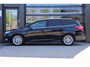 Ford Focus Wagon 1.5 Titanium | NAP | Clima | Cruise | Navi | Parkeerhulp | Airco | LM Velgen |