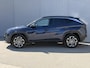 Hyundai Tucson 1.6 T-GDI HEV Facelift Comfort Smart / Fabrieksgarantie tot 7-2029 / HUD / Navigatie / Adpatieve Cruise / Camera / Stoel Verwarming / Stuurwiel Verwarming / DAB / Elektr. Achterklep /