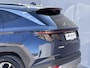 Hyundai Tucson 1.6 T-GDI HEV Facelift Comfort Smart / Fabrieksgarantie tot 7-2029 / HUD / Navigatie / Adpatieve Cruise / Camera / Stoel Verwarming / Stuurwiel Verwarming / DAB / Elektr. Achterklep /