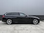 BMW 3-Serie Touring 320i Centennial Executive | M Sport | LED | Navigatie | PDC |