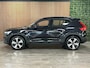 Volvo XC40 Recharge Ultimate 70 kWh | Trekhaak | All Season banden | Schuifdak | 360° Camera | Harman Kardon | Adaptieve Cruise Control | Bestuurdersstoel elektrisch geheugen | Stoel en Stuurwielverwarming | 19 Inch | Passagiersstoel elektrisch | Microtech / alcantara bekleding | Zitting verlenging voorstoelen | Pilot Assist | BLIS Dode Hoek Detectie | Warmtepomp | Google Infotainment | Keyless Drive | Verlichtingspack 2 | Parkeersensoren voor+achter | Elektrisch bedienbare achterklep | Breedstralers in voorbumper | Draadloos telefoon opladen | DAB Radio | Apple Carplay/Android Auto | Volvo On Call met mobiele App functie | Onyx Black Metallic |