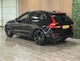Volvo XC60 T8 AWD Recharge Ultra Black Edition | Luchtvering | Trekhaak | 360° Camera | 455pk | Head-Up Display | Harman Kardon | Adaptieve Cruise Control | Stoelverwarming voor+achter | Stuurwielverwarming | Schuifdak | Full LED Meesturende koplampen | Pilot Assist | BLIS Dode Hoek Detectie | Elektrische voorstoelen geheugen | Contour stoelen met wit stiksel en bies | Zitting verlenging voorstoelen | Lederen dashboard | 21 Inch | Google Infotainment | Keyless Drive | Elektrisch bedienbare achterklep | DAB Radio | Apple Carplay/Android Auto | Alarm Klasse III | Draadloos telefoon opladen | Volvo On Call met mobiele App functie | Onyx Black Metallic |