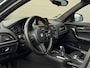 BMW 1-Serie 118i/136pk Essential|2015|Automaat|NAP|H&K|Leder|Clima|Zwarte hemel|16" LMV