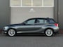 BMW 1-Serie 118i/136pk Essential|2015|Automaat|NAP|H&K|Leder|Clima|Zwarte hemel|16" LMV