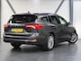 Ford Focus Wagon 125PK Titanium | 1ste eigenaar | AppleCarPlay/AndroidAuto | Winterpack | Stoel/Stuur/Voorruitverwarmd | Adaptief Cruise Control | Keyless | LED lampen | 17"LMV | Isofix | Privacy Glass | Parkeersensoren | Navigatie |