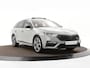 Skoda Octavia Combi 1.4 TSI RS iV PHEV 245pk DSG Business · Panoramadak · Stuur- & Stoelverwarming · Keyless · Sfeerverlichting · Elek. Achterklep ·