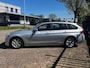 BMW 3-Serie Touring 320d EDE Corporate Lease Essential (Trekhaak, Parkeersensoren, Lederen Bekleding etc.)