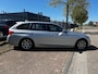 BMW 3-Serie Touring 320d EDE Corporate Lease Essential (Trekhaak, Parkeersensoren, Lederen Bekleding etc.)