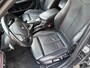 BMW 1-Serie 114i Business+ / SPORT / LEER / SCHUIFDAK / NAVI / STOELVERWARMING