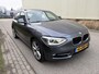 BMW 1-Serie 114i Business+ / SPORT / LEER / SCHUIFDAK / NAVI / STOELVERWARMING