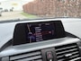 BMW 1-Serie 114i Business+ / SPORT / LEER / SCHUIFDAK / NAVI / STOELVERWARMING