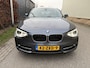 BMW 1-Serie 114i Business+ / SPORT / LEER / SCHUIFDAK / NAVI / STOELVERWARMING