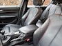 BMW 1-Serie 114i Business+ / SPORT / LEER / SCHUIFDAK / NAVI / STOELVERWARMING