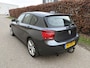 BMW 1-Serie 114i Business+ / SPORT / LEER / SCHUIFDAK / NAVI / STOELVERWARMING