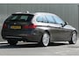 BMW 3-Serie Touring 320i Executive Luxury Pano Navi Leder Camera