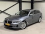BMW 5-Serie Touring 520e Business | navi | leder | panorama | trekhaak |