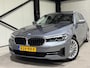 BMW 5-Serie Touring 520e Business | navi | leder | panorama | trekhaak |