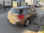 BMW 1-Serie 118i 5Drs Airco Navigatie Automaat Bruin