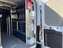 Ford Transit 350 2.0 TDCI L2H2 RWD 170pk Kastinrichting Werkplaatsinrichting Airco Cruise controle Navigatiesysteem Telefoonverbinding Parkeersensoren voor en achter 2-Persoons Bpm vrij  Sortimo Werkplaats Omvormer St