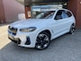BMW iX3 High Executive M Sport Shadow Line 80 kWh // HUD-DISPLAY // SCHUIF-KANTELDAK // LEDER+ELEK. STOELEN // HARMAN&KARDON AUDIO // ELEK. KLEP// ADAPT. CRUISE // KEYLESS // 360 CAMERA //