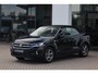 Volkswagen T-Roc Cabrio 1.5 TSI R-Line 150PK / 110kW DSG, Afneembare trekhaak, navigatie, dodehoekdetectie (side assist), R-Line in- en exterieur, verwarmbare voorstoelen, verwarmbaar multifunctioneel lederen stuurwiel, 4 seizoenen banden, 2-zone climatronic, draadloos Apple Carplay & Android Auto, DAB+, parkeersensoren voor en achter (pdc), parkeerassistent (park assist), LED plus koplampen, elektrisch verstel-, verwarm- en inklapbare buitenspiegels (spiegelpakket) etc.