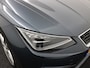 SEAT Ibiza 1.0 TSI FR Business Intense Plus Apple Carplay/Android Auto, Draadloze telefoonlader, Elektrisch glazen panorama-dak, Parkeersensor voor en achter, Virtual cockpit, Voorstoelen verwarmd, Cruise control Deze SEAT Ibiza 1.0 TSI FR Business Intense Plus uit 2021 is een sportieve en complete hatchback die comfort en rijplezier perfect combineert. Dankzij de automatische transmissie rijd je moei