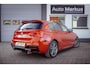 BMW 1-Serie M135i xDrive|Schuifdak|Memory|Valencia Orange|Keyless|M-performance remmerij