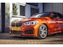 BMW 1-Serie M135i xDrive|Schuifdak|Memory|Valencia Orange|Keyless|M-performance remmerij