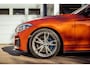 BMW 1-Serie M135i xDrive|Schuifdak|Memory|Valencia Orange|Keyless|M-performance remmerij