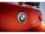 BMW 1-Serie M135i xDrive|Schuifdak|Memory|Valencia Orange|Keyless|M-performance remmerij