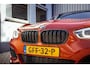 BMW 1-Serie M135i xDrive|Schuifdak|Memory|Valencia Orange|Keyless|M-performance remmerij