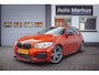 BMW 1-Serie M135i xDrive|Schuifdak|Memory|Valencia Orange|Keyless|M-performance remmerij