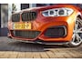 BMW 1-Serie M135i xDrive|Schuifdak|Memory|Valencia Orange|Keyless|M-performance remmerij