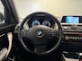 BMW 1-Serie 118i Corporate Lease Executive (CRUISE, NAVI, STOELVERWARMIING, PARKEERSENSOREN, GOED ONDERHOUDEN)