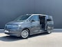 Volkswagen Multivan eHybrid 4MOTION L2 | Bulli | Leder | Glazen Dak | Vis-a-Vis | Houtlook Vloer | 4-Seizoenen Banden