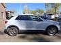 Volkswagen T-Roc 1.0 TSI Style Business metallic grijs. o.a. carplay, stoelverwarming, navi, pdc. Zeer netjes.