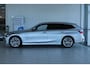 BMW 3-Serie Touring 330 e Luxury Line ''OP AFSPRAAK'' | Driving Professional | Head-up | Trekhaak | Camera | Stoelverwarming | Elektr. Klep | Adapt. Cruise | Navi | Carplay | Climate 3 zone | 18 Inch