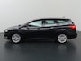Ford Focus Wagon 1.0 Titanium Edition | Navigatie | Climate Control | Parkeersensoren | Cruise Control | Voorruitverwarming |