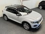 Volkswagen T-Roc 1.5 TSI SPORT VIRTUAL COCKPIT NAVIGATIE ADAPTIVE CRUISE CONTROL CLIMATE CONTROL STOELVERWARMING RIJSTROOKSENSOREN DODEHOEKSENSOREN ACHTERUITRIJCAMERA AFN. TREKHAAK