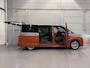Volkswagen Multivan 1.4 eHybrid L2 Energetic 7p. PANO/HEAD-UP/TREKHAAK/CAMERA/SFEER/CARPLAY/IQ-LIGHT/KEYLESS/ACC/ADAPTIVE-ONDERSTEL/18"/PRIVACY/TWO-TONE ORANGE-SILVER/VOLLEDIG VW DEALER HISTORIE