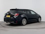 Toyota Corolla Touring Sports 1.8 HYBRID FIRST EDITION | TREKHAAK | CLIMA | CRUISE ADAPTIEF | CAMERA | NAVI | PRIVACY GLASS | 17'' LM VELGEN | STUUR- & STOELVERWARMING |